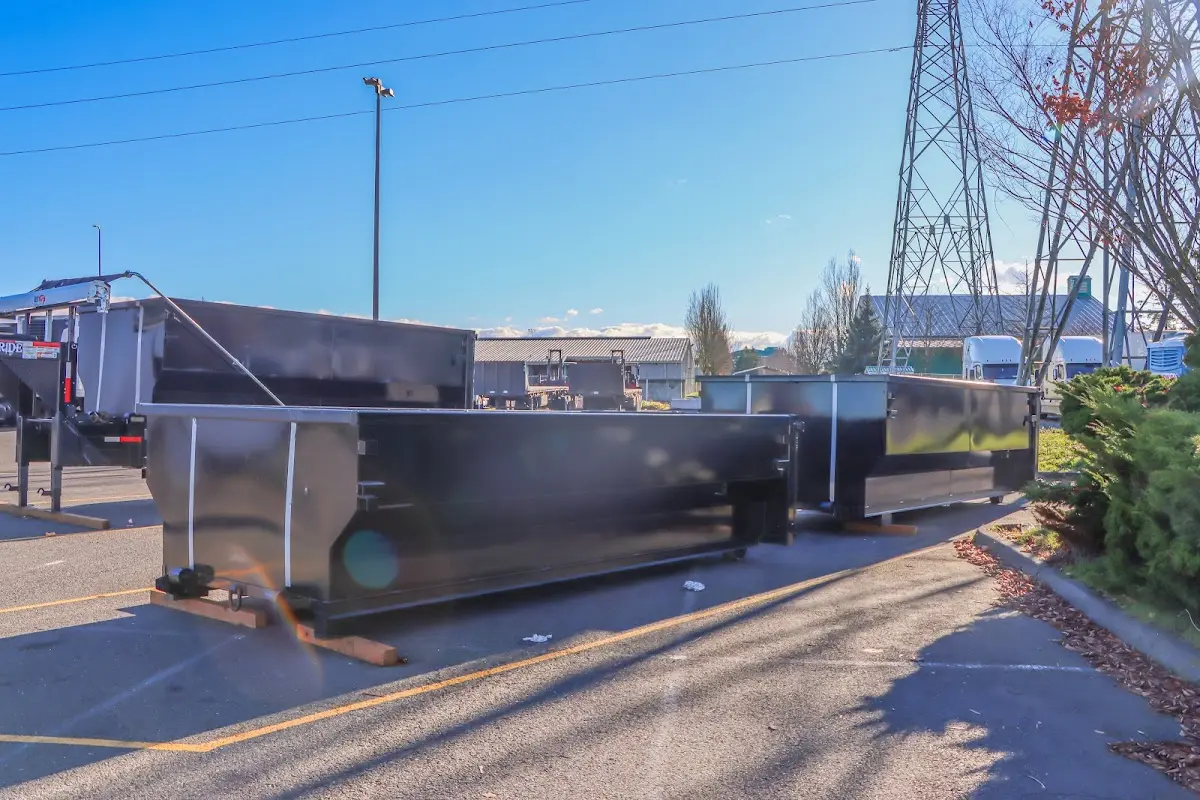 Roll-off dumpster ready for waste disposal at job site for Commercial Dumpster Rental in Cramerton